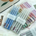 Set of 4 Twisted Taper Dinner Candles